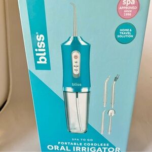 NEW Bliss Spa To Go Portable Cordless Oral Irrigator NIB Blue